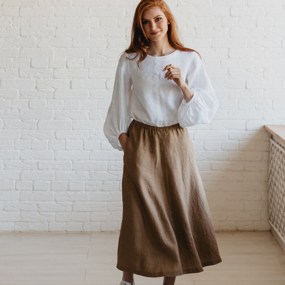 
                      
                        Puff Sleeve Linen Top
                      
                    