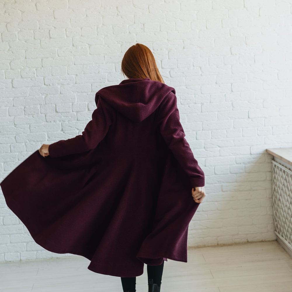 
                      
                        Merino Wool Flared Coat in Midi Length
                      
                    