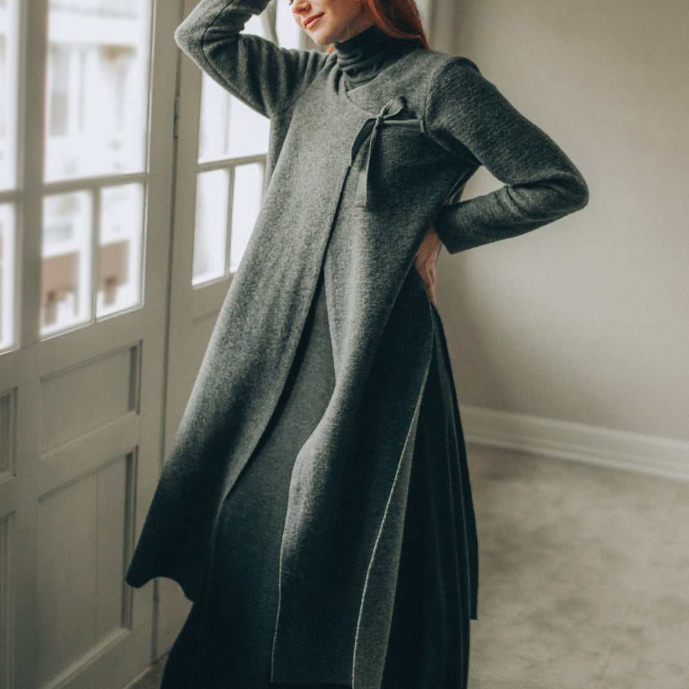 Long gray wool cardigan with side slits and tie closure for a modern, cozy fit