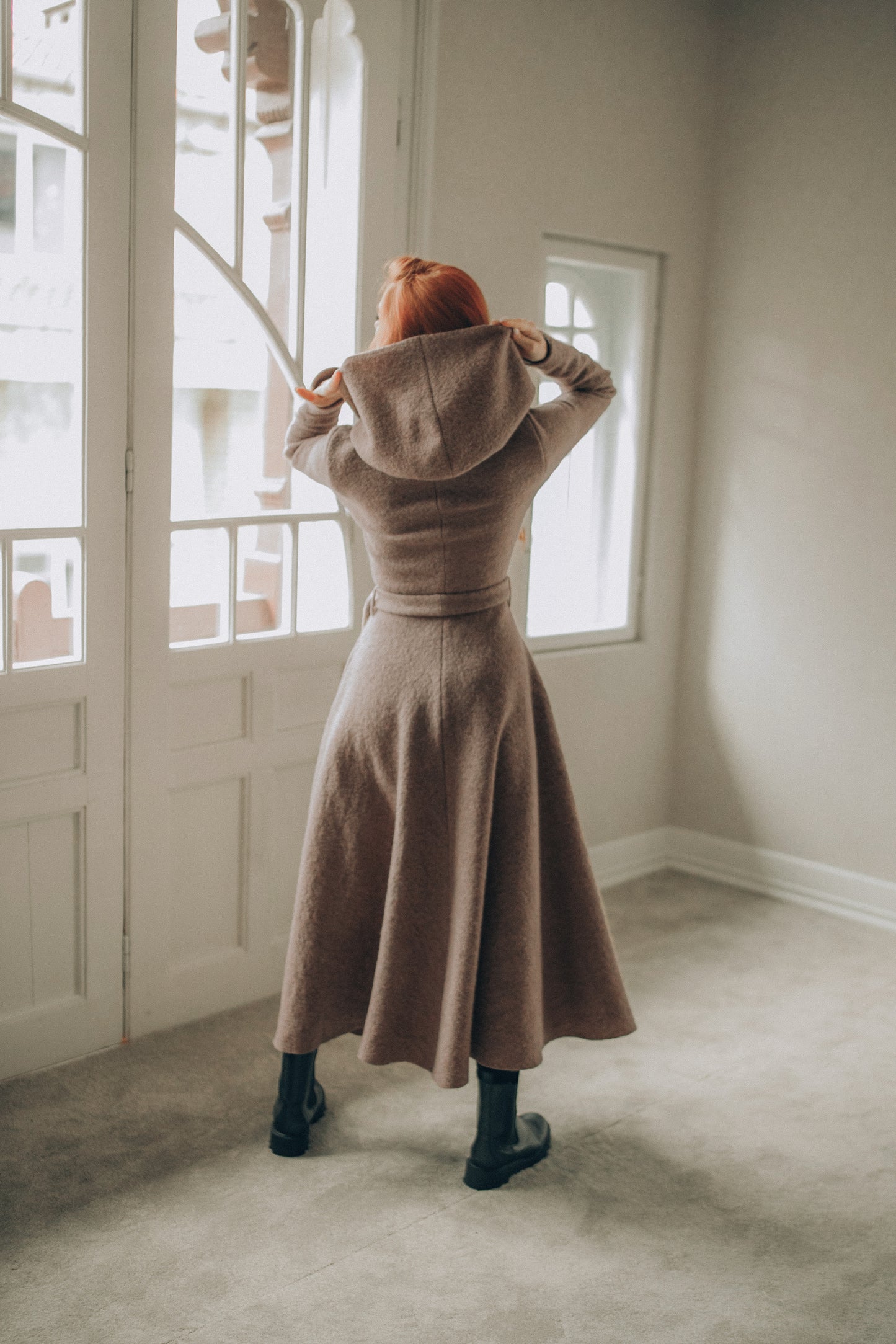 Maxi wool hooded cardigan coat in princess silhouette with adjustable belt and flowing skirt