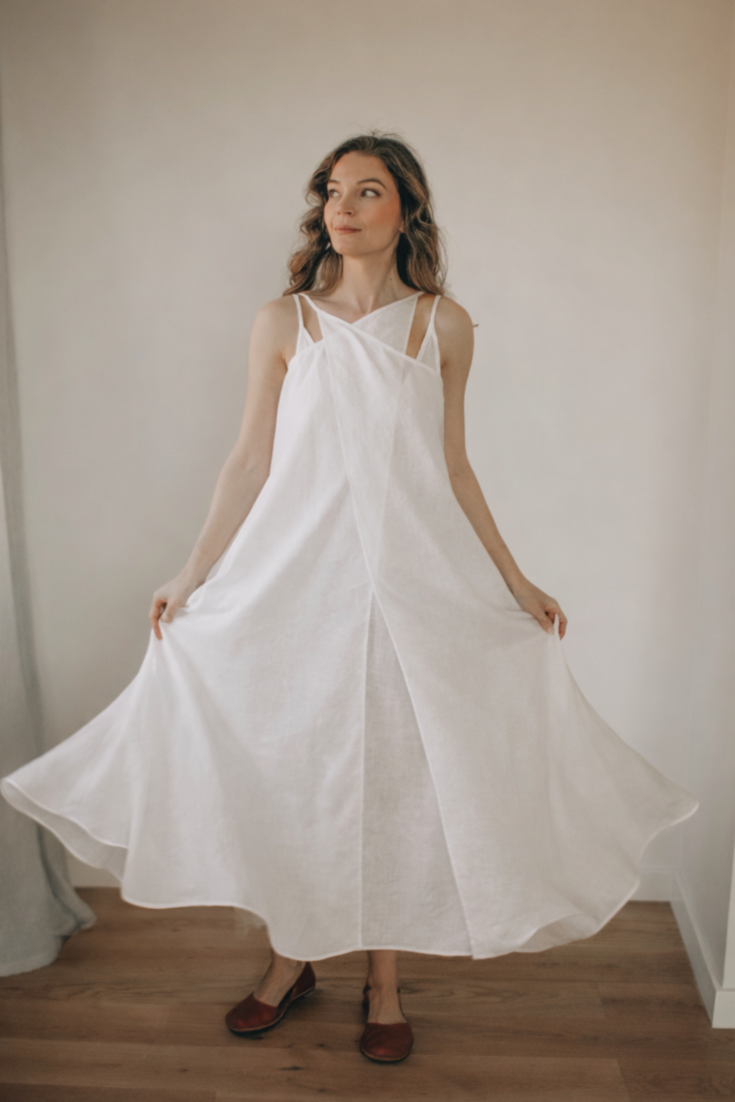 Elegant summer linen dress with slip, lightweight and breathable, perfect for warm weather.