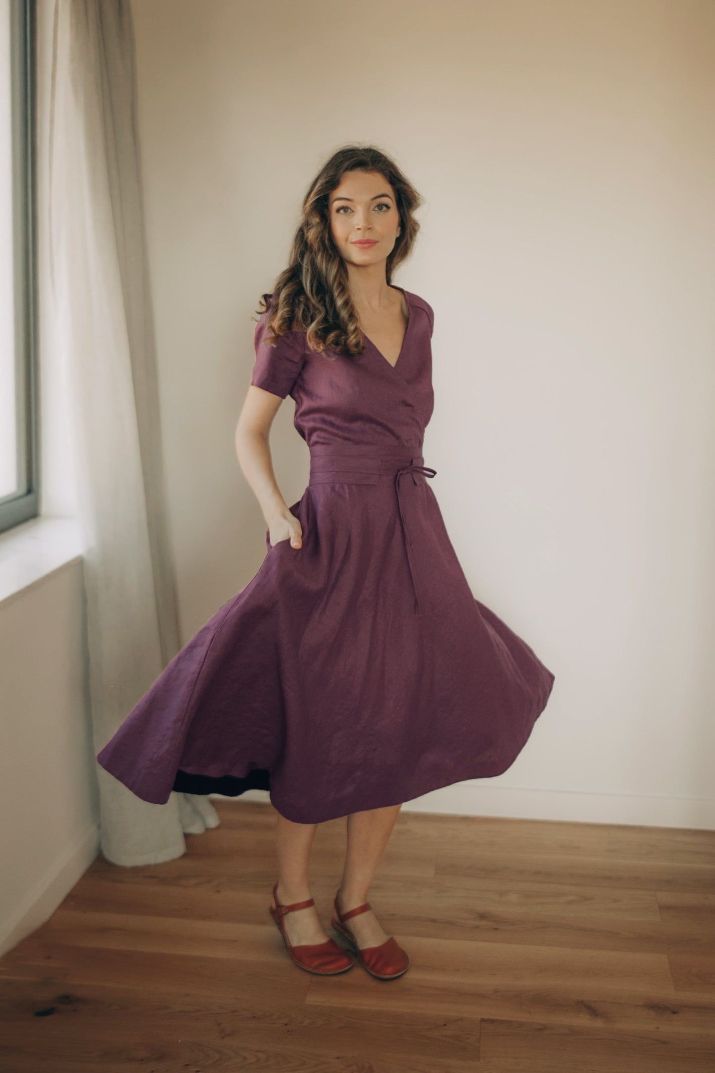 Amethyst purple linen midi dress with faux wrap style and side pockets