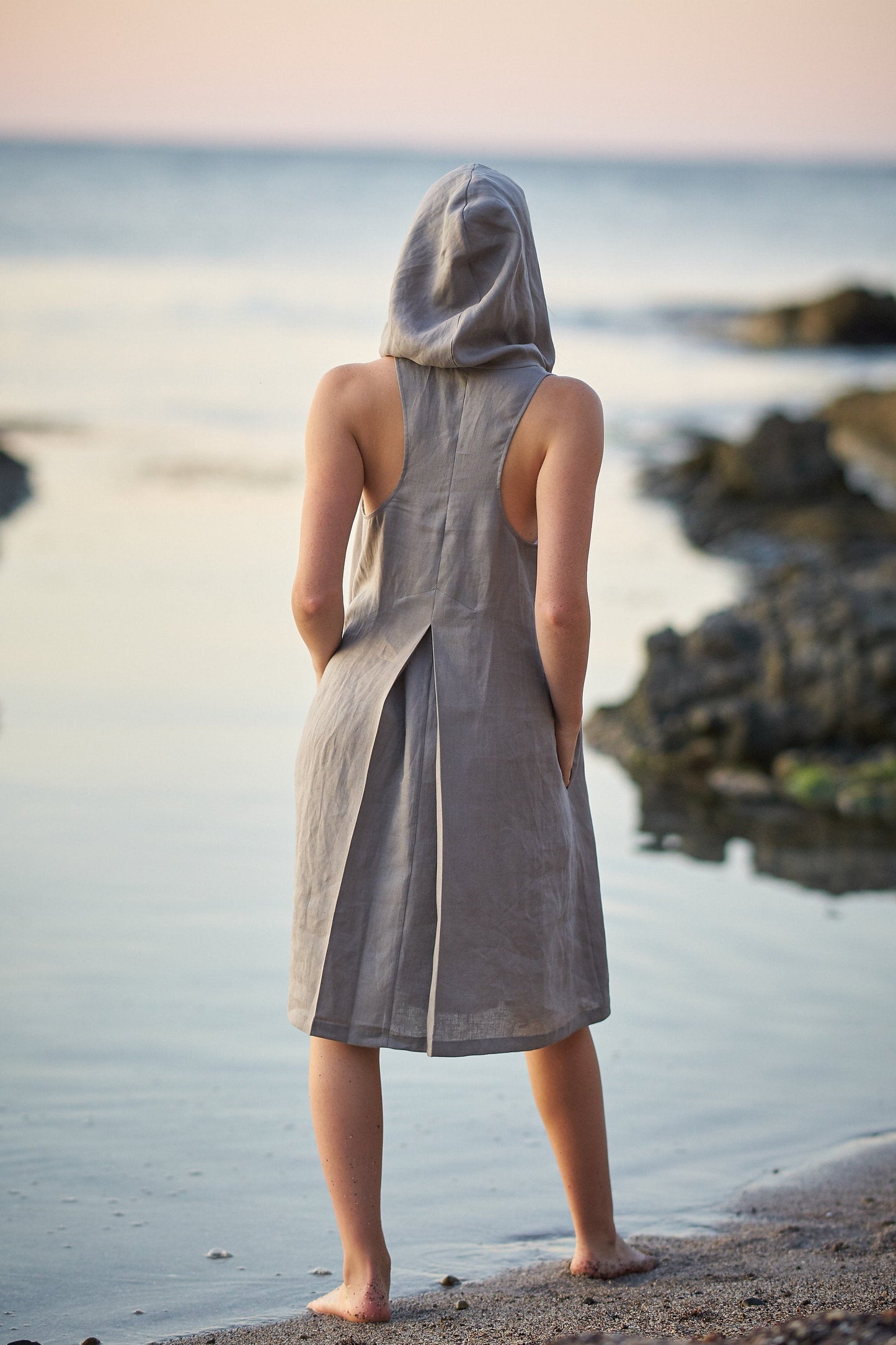 hooded towelling beach dress women's Hooded towel beach dress made of soft toweling in hot pink, red, blue, black and white for beach or pool. Handmade in Australia and designed for beach culture. Easy change underneath in
